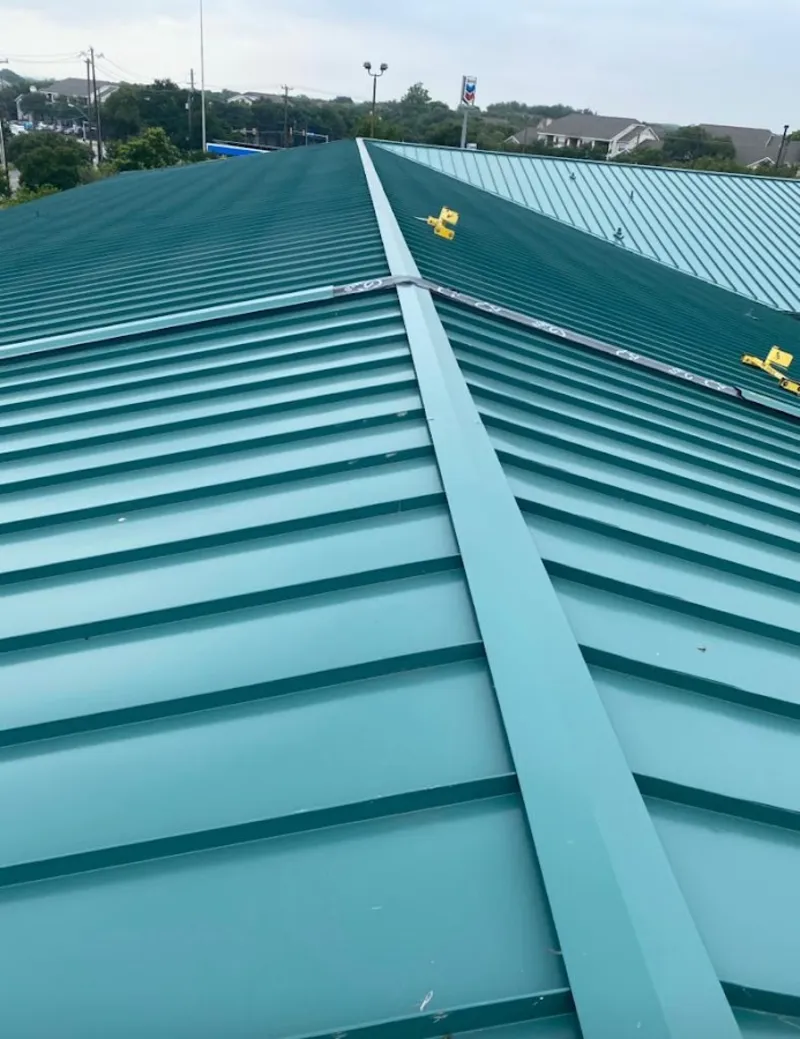 Green commercial metal roof ridge and valley for Metal Roof Repair in Eidson Road
